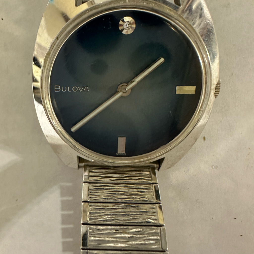 Bulova Silver Timepiece With Deep Blue Face